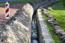 Roadside Ditch Cleaning, Pavement Coating & Repair